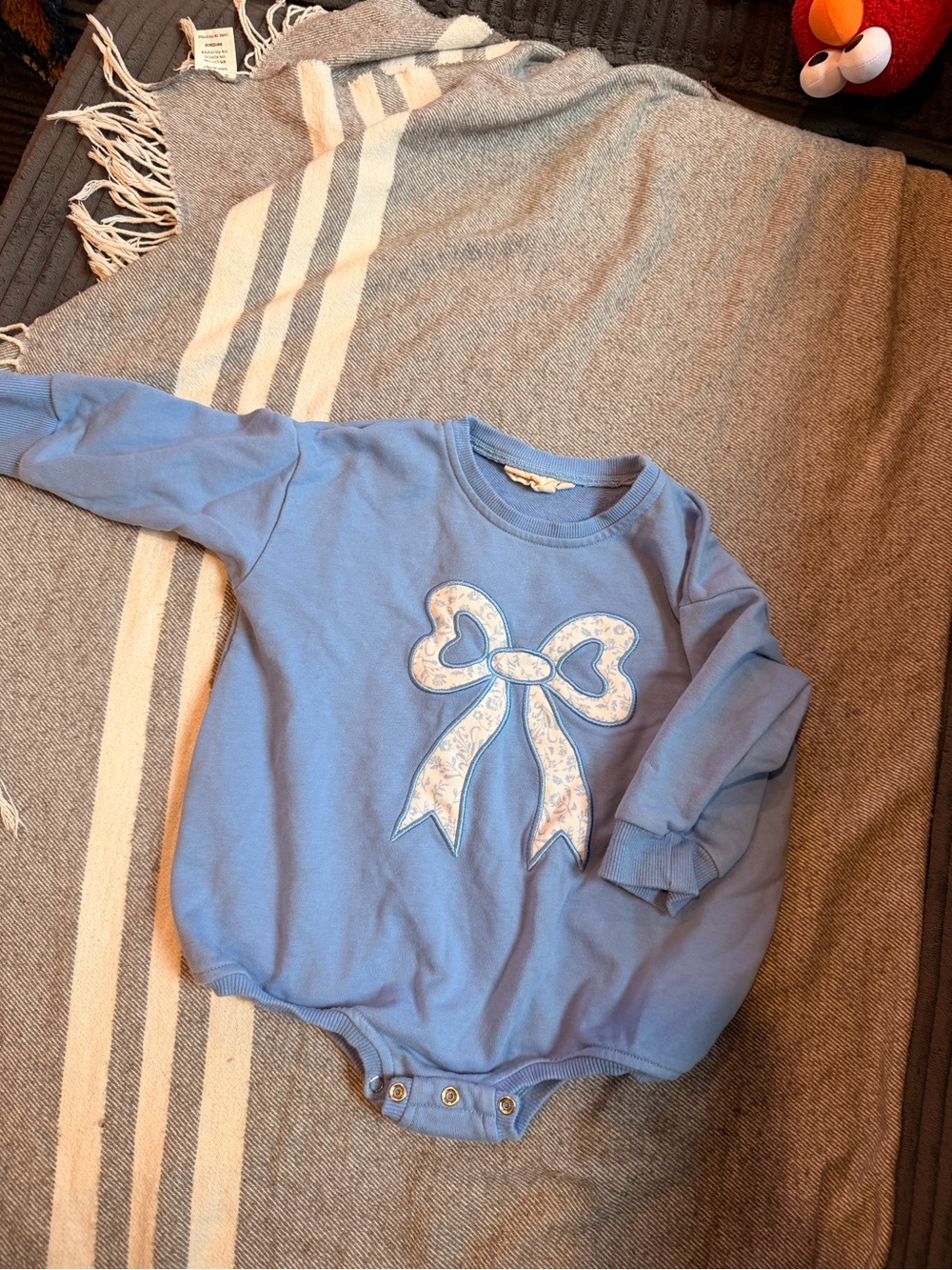 Little Joy Co Blue Bow Long-Sleeve bubble romper